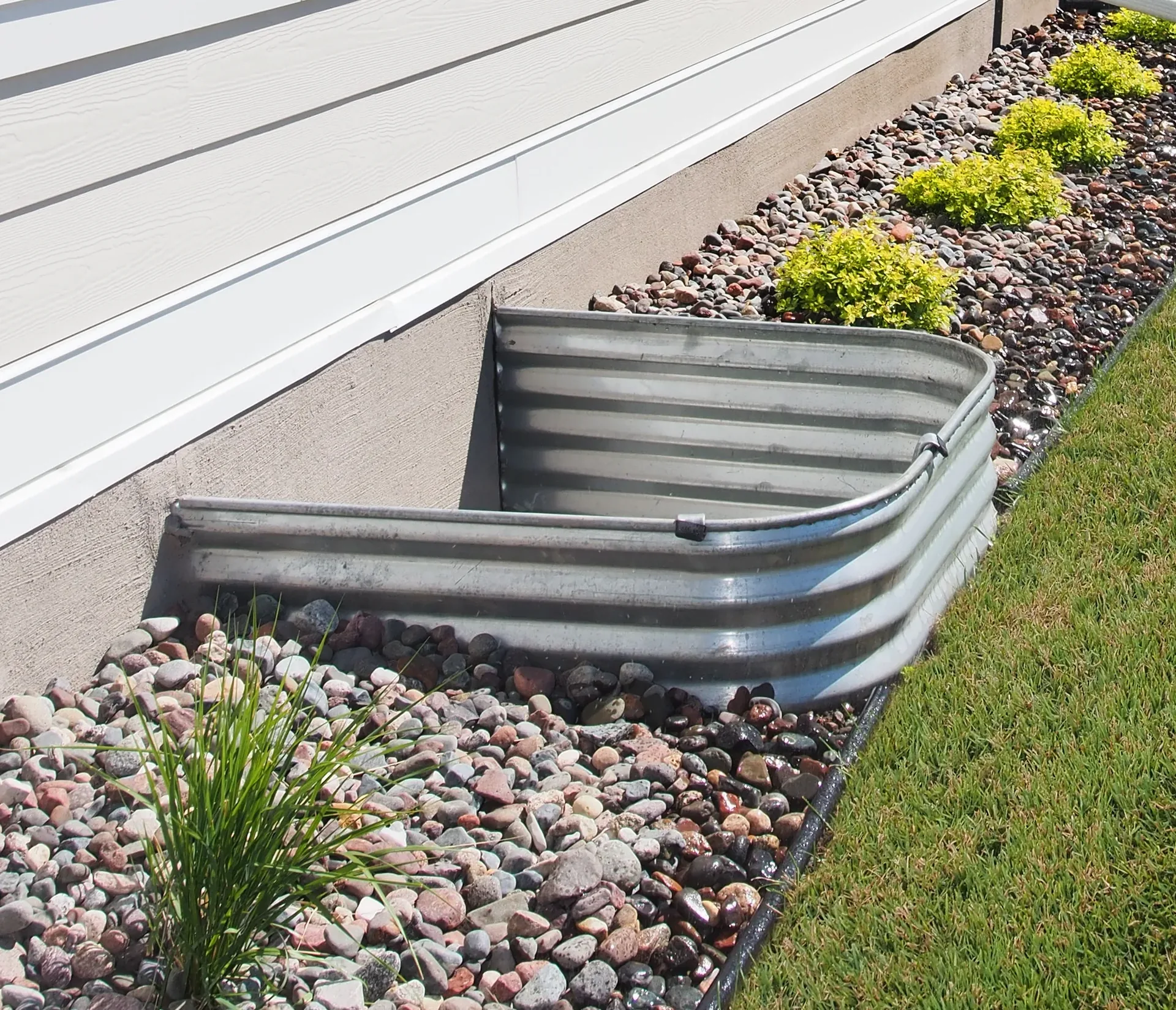 EcoSpect Egress Window Well Installation